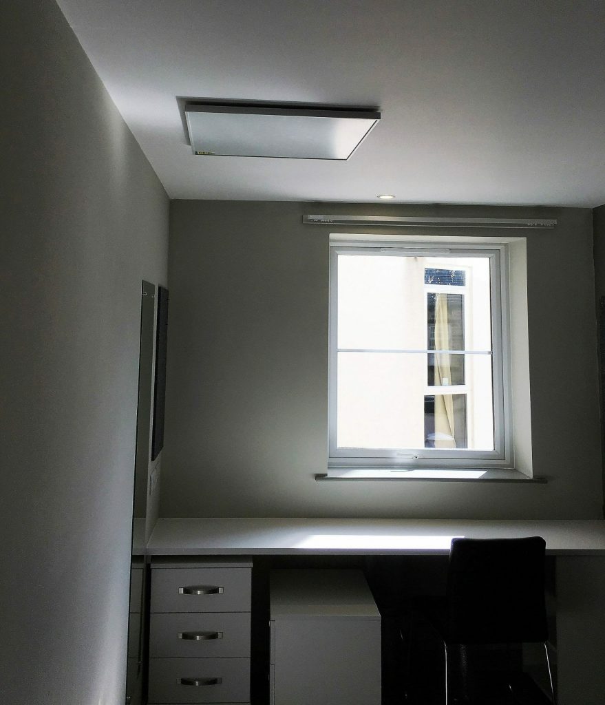 Ceiling mounted electric heating for student accommodation