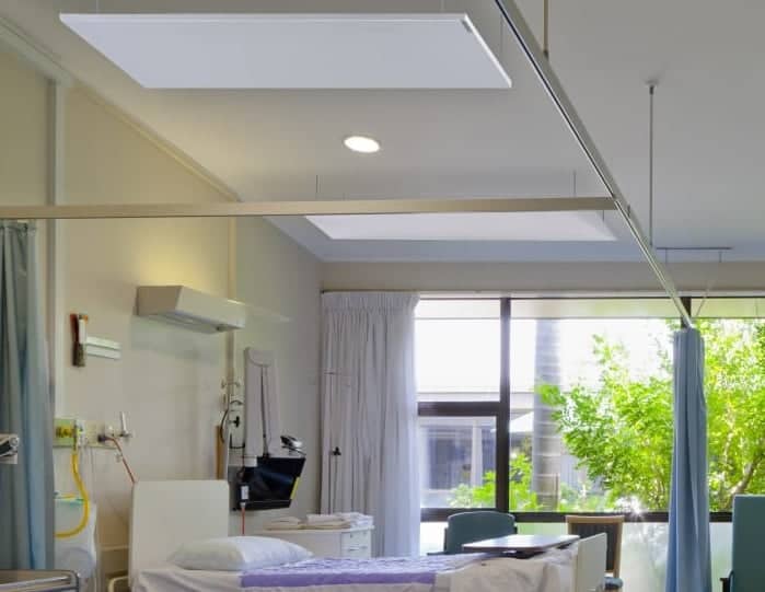 Select XLS infrared panels suspended over hospital beds