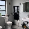 Bathroom with XLS Towel heater black 1200x700
