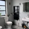 Bathroom with XLS Towel heater black 1200x700