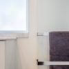 Select XLS Infrared Towel Heater installed in bathroom