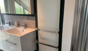 Select XLS Infrared Towel Heater installed in bathroom