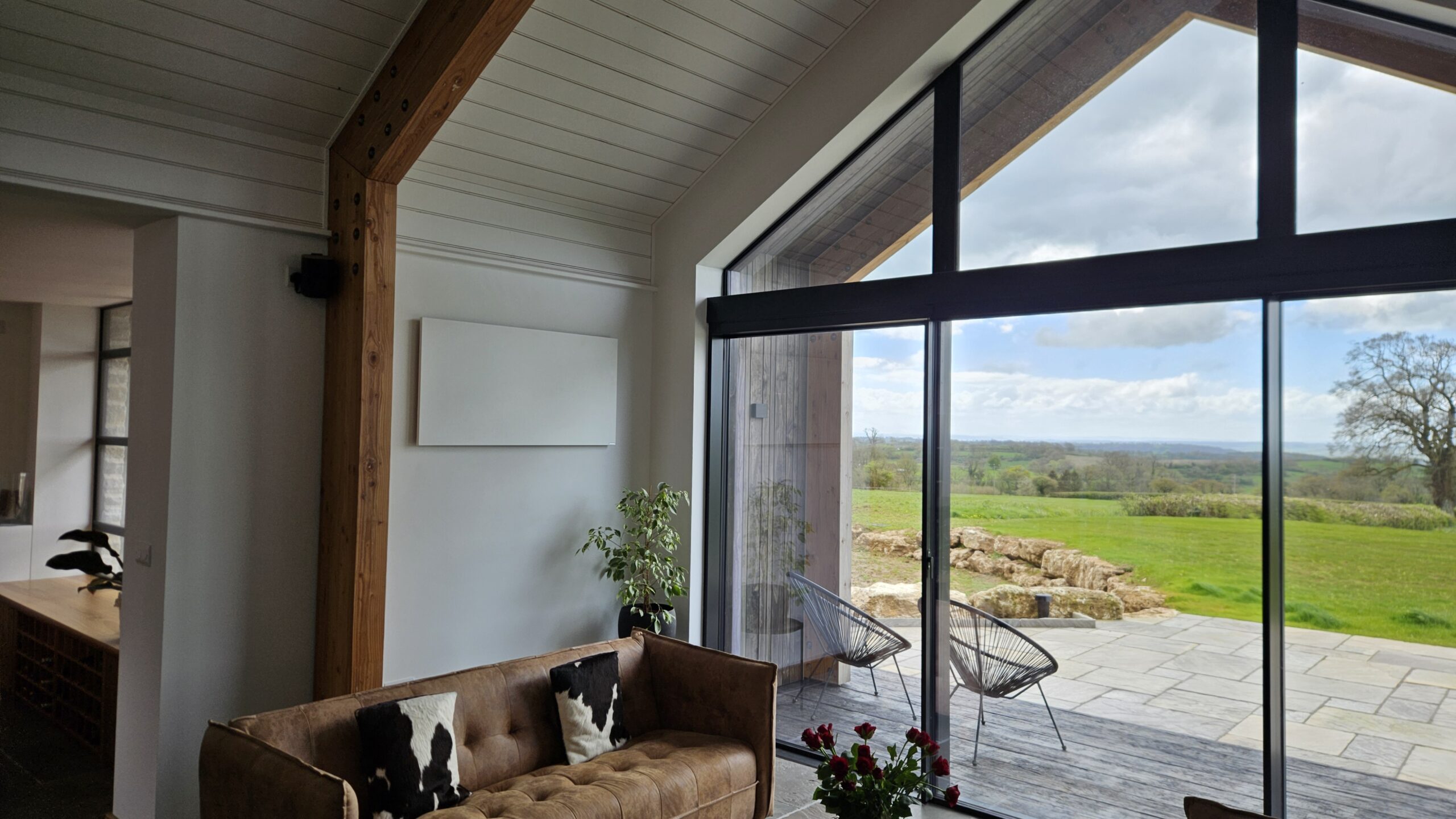 Herschel Comfort white infrared panel heater wall-mounted in a self-build home