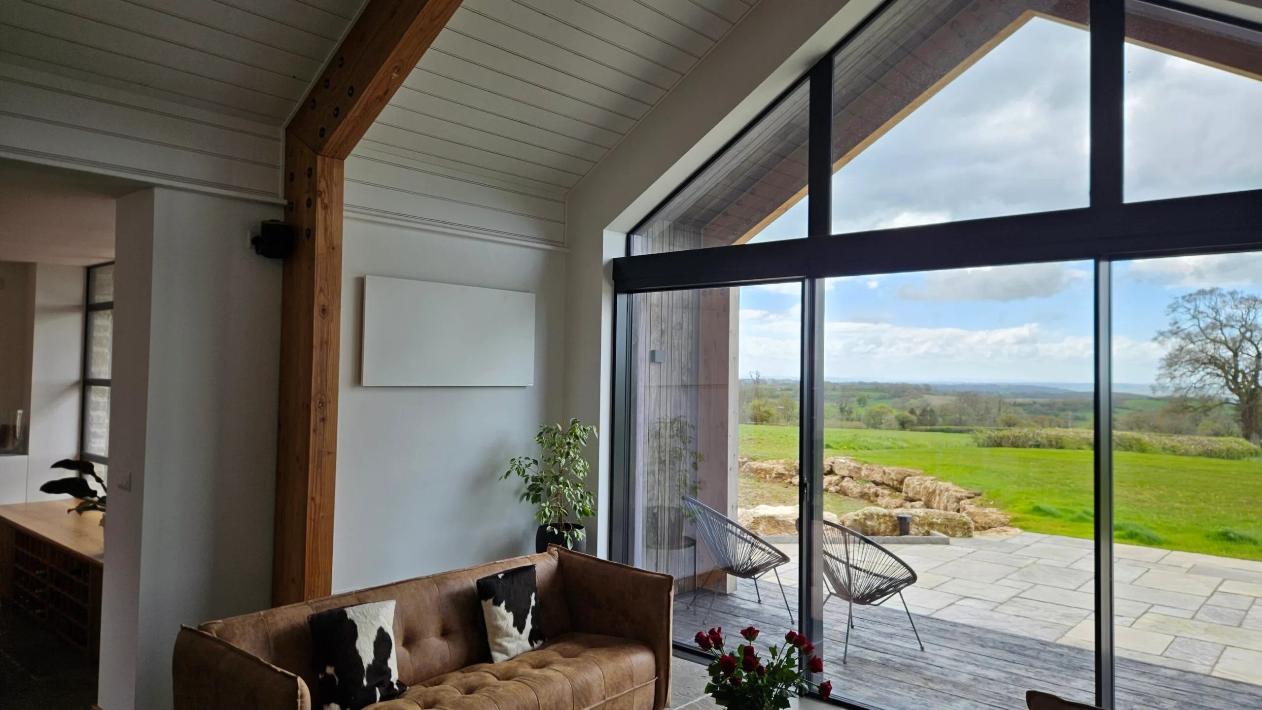 Herschel Comfort white infrared panel heater wall-mounted in a self-build home