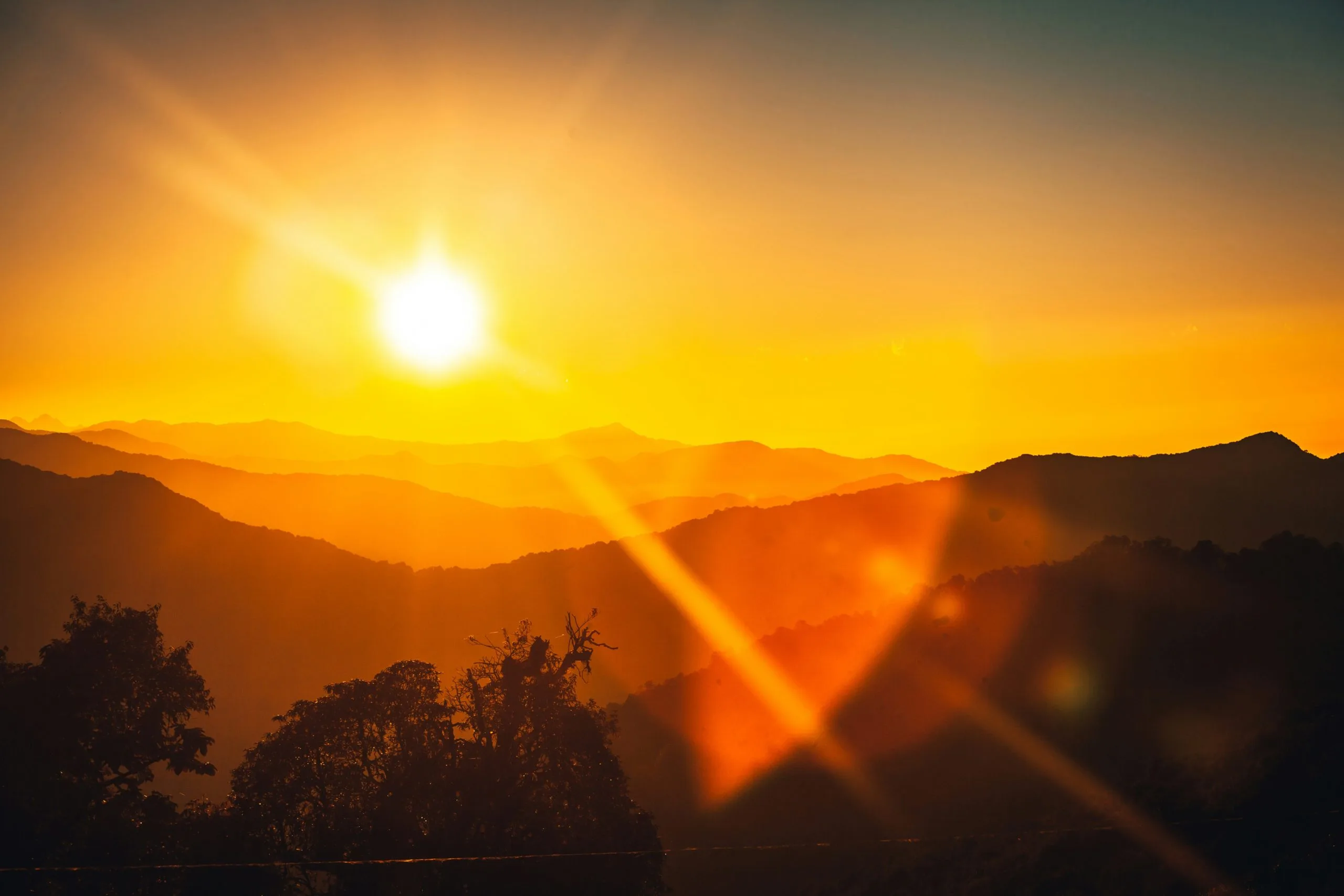 Low sun over mountains