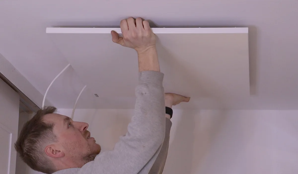 Comfort panel being installed on ceiling